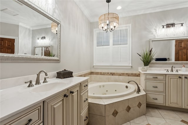 bathroom featuring vanity, crown molding, tiled tub, an inviting chandelier, and tile patterned flooring