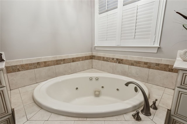 bathroom featuring tiled tub