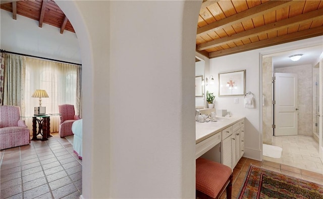 bathroom featuring beam ceiling, vanity, and wooden ceiling