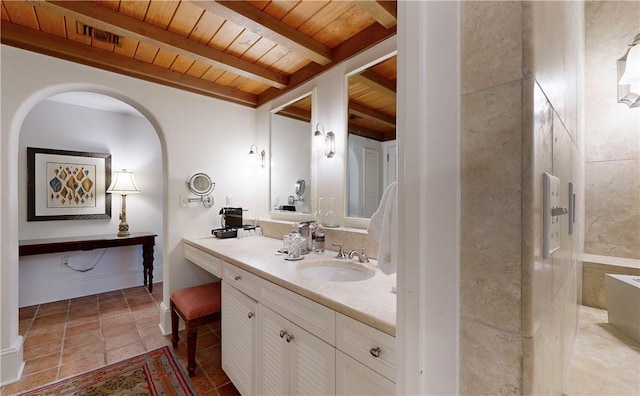 bathroom featuring vanity, beam ceiling, and wooden ceiling