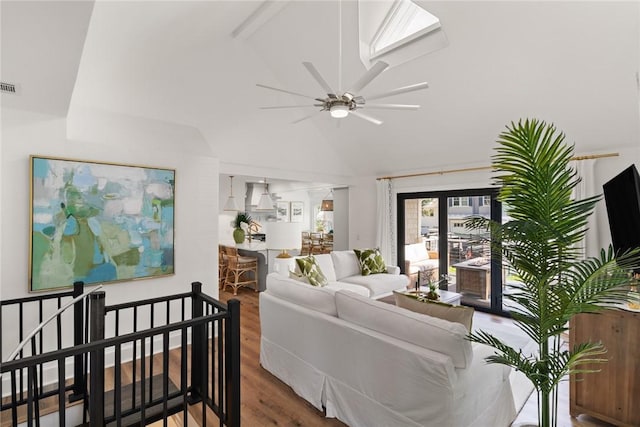 108 Hamilton St, Saint Simons Island, GA 31522 - living area with lofted ceiling, wood finished floors, and a ceiling fan
