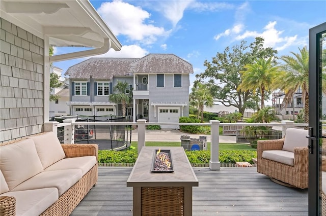 108 Hamilton St, Saint Simons Island, GA 31522 - deck featuring an outdoor living space with a fire pit