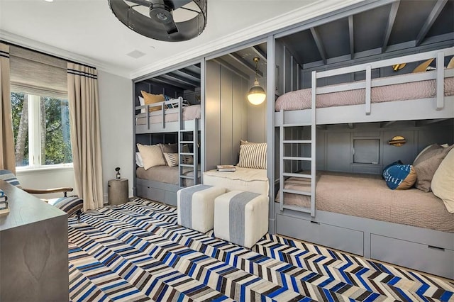 bedroom featuring carpet floors and ornamental molding