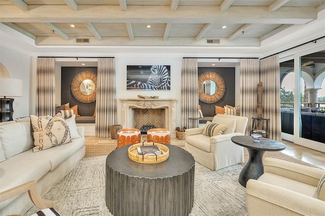 interior space with beam ceiling and crown molding