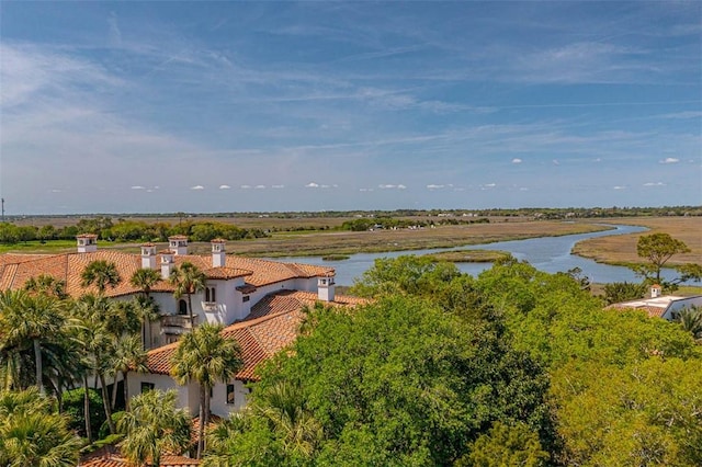 birds eye view of property featuring a water view