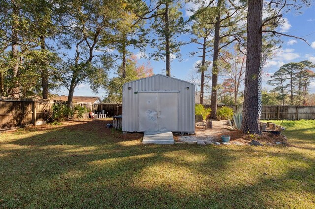15 Merganser Way, Woodbine, GA 31569 - view of shed featuring a fenced backyard