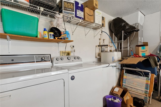15 Merganser Way, Woodbine, GA 31569 - laundry area featuring separate washer and dryer, laundry area, and a textured ceiling