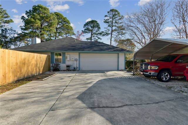 15 Merganser Way, Woodbine, GA 31569 - exterior space featuring a carport, concrete driveway, and fence