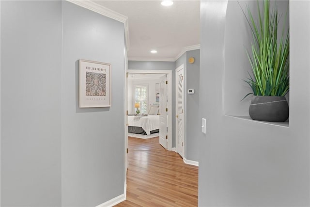 142 Montrose, Saint Simons Island, GA 31522 - hallway with ornamental molding, baseboards, light wood-style flooring, and recessed lighting