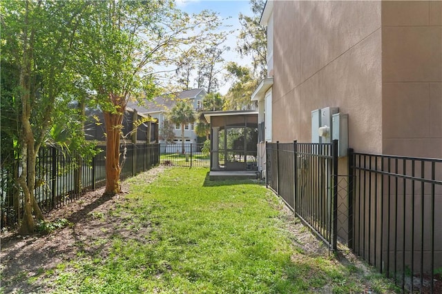 142 Montrose, Saint Simons Island, GA 31522 - view of yard featuring a sunroom