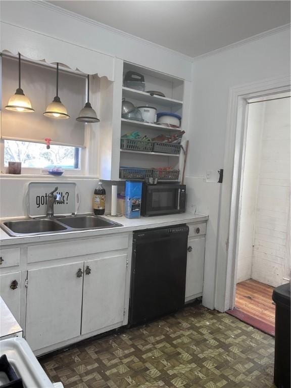 1401 Carswell Ave, Waycross, GA 31501 - kitchen with black appliances, a sink, ornamental molding, white cabinets, and light countertops