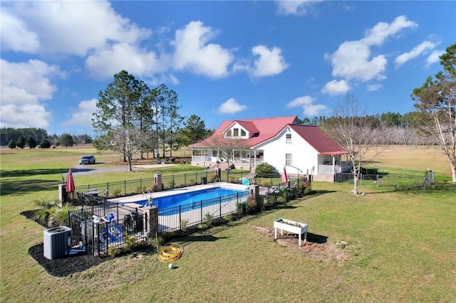 view of pool featuring a fenced in pool, a yard, and fence