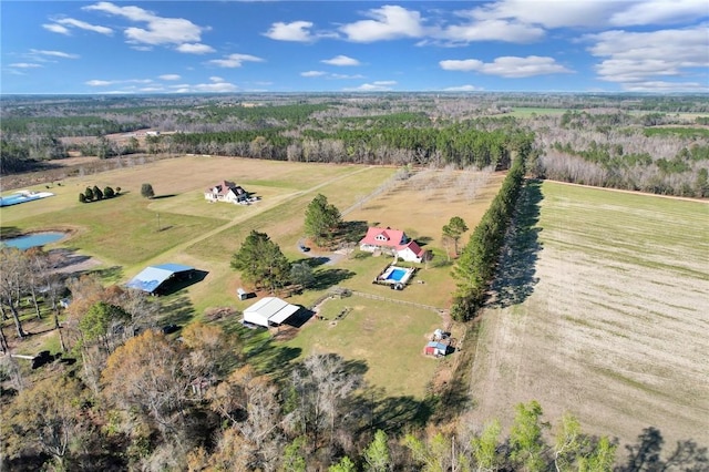 birds eye view of property with a rural view