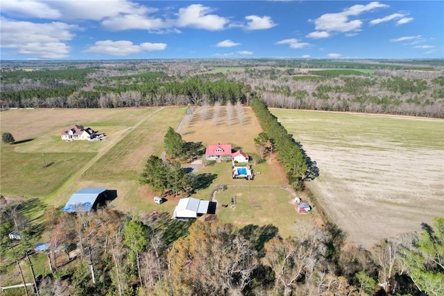 birds eye view of property featuring a rural view