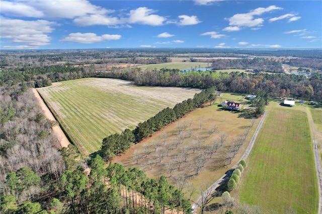 birds eye view of property featuring a rural view