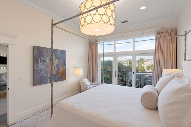 800 Ocean Blvd Unit 205, Saint Simons Island, GA 31522 - carpeted bedroom featuring access to exterior, ornamental molding, and french doors