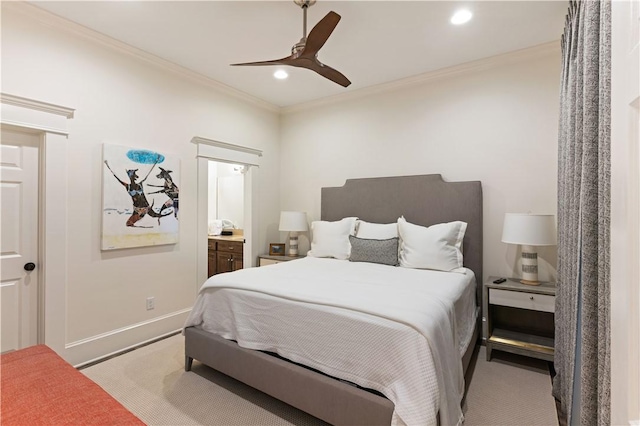 800 Ocean Blvd Unit 205, Saint Simons Island, GA 31522 - carpeted bedroom with ceiling fan, ensuite bathroom, and crown molding
