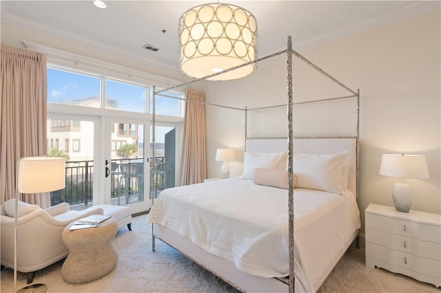 800 Ocean Blvd Unit 205, Saint Simons Island, GA 31522 - carpeted bedroom with access to outside and ornamental molding
