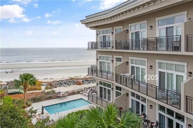 800 Ocean Blvd Unit 205, Saint Simons Island, GA 31522 - exterior space featuring a view of the beach, a patio, and a water view