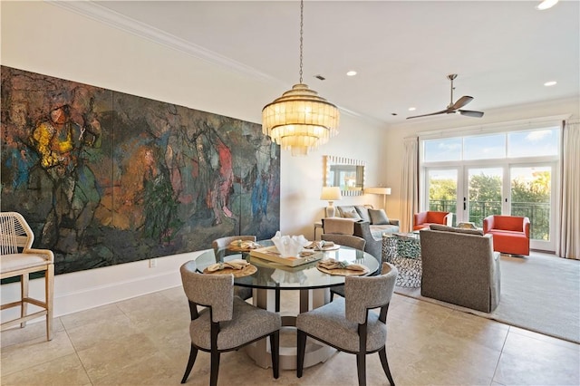 800 Ocean Blvd Unit 205, Saint Simons Island, GA 31522 - tiled dining area featuring ceiling fan with notable chandelier and crown molding