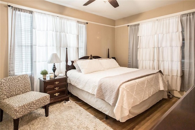 bedroom featuring ceiling fan and wood finished floors