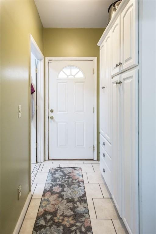 entryway featuring light tile patterned flooring