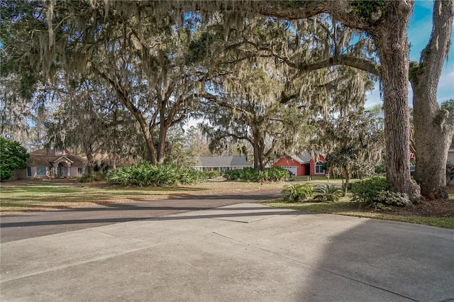 view of front of house featuring an attached garage and concrete driveway