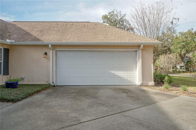 garage with driveway