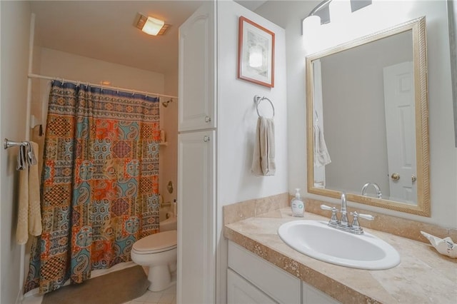 full bathroom featuring tile patterned floors, toilet, and vanity