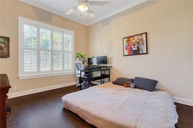 bedroom featuring dark wood-style floors, a ceiling fan, and baseboards