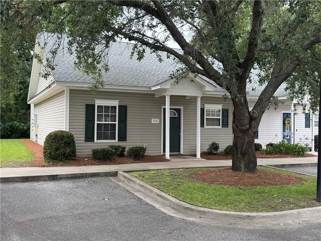 448 Moss Creek Ln, Brunswick, GA 31520 - bungalow featuring roof with shingles