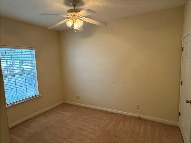 448 Moss Creek Ln, Brunswick, GA 31520 - unfurnished room featuring light colored carpet, ceiling fan, and a textured ceiling