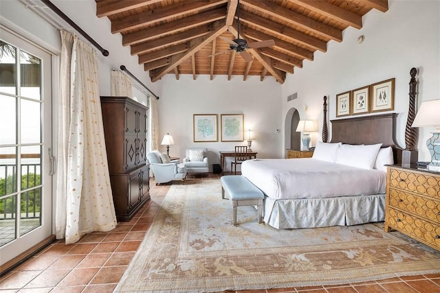 tiled bedroom featuring beamed ceiling, access to exterior, wooden ceiling, and high vaulted ceiling