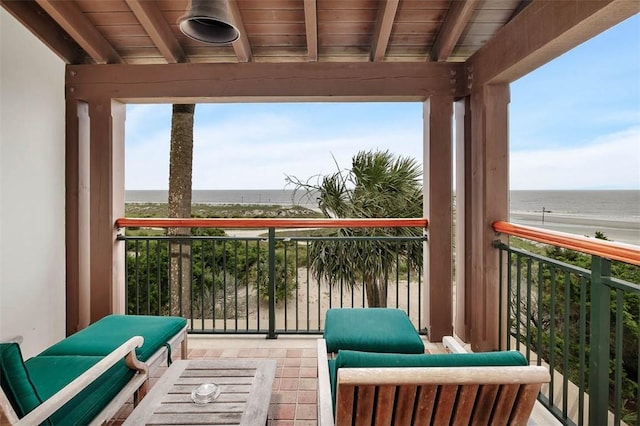 balcony featuring a water view