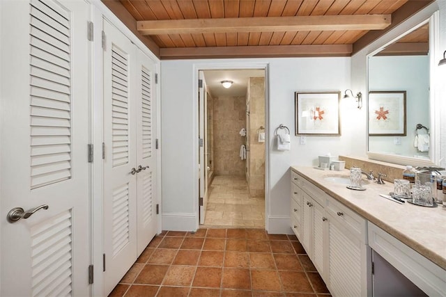 bathroom with beam ceiling, a shower with door, vanity, and wood ceiling