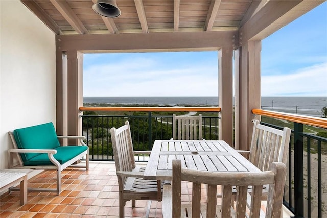 balcony featuring a water view