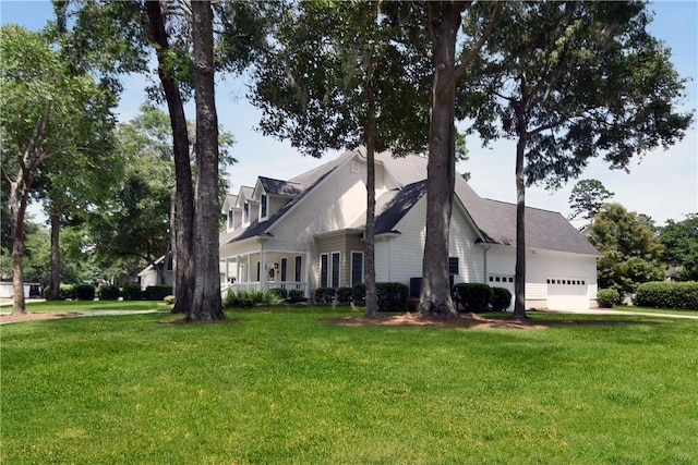 103 Bellrain Ln, Saint Simons Island, GA 31522 - view of home's exterior featuring a yard and a garage