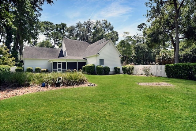 103 Bellrain Ln, Saint Simons Island, GA 31522 - back of property with a sunroom