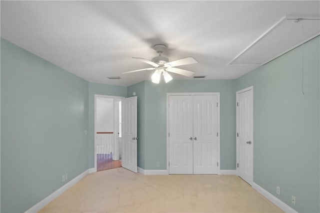 103 Bellrain Ln, Saint Simons Island, GA 31522 - unfurnished bedroom with light colored carpet and a ceiling fan