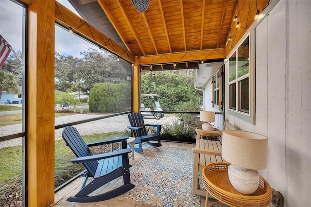 sunroom with wooden ceiling