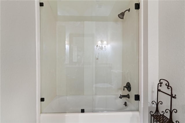 316 Forest Oaks, Saint Simons Island, GA 31522 - full bathroom featuring bath / shower combo with glass door and a textured wall