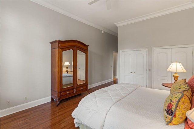 316 Forest Oaks, Saint Simons Island, GA 31522 - bedroom featuring baseboards, wood finished floors, two closets, and crown molding