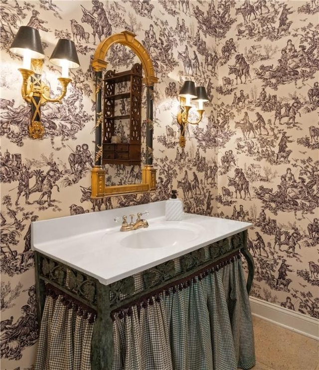 316 Forest Oaks, Saint Simons Island, GA 31522 - bathroom featuring vanity, baseboards, and wallpapered walls