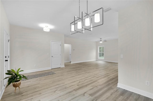 interior space with ceiling fan and light hardwood / wood-style floors