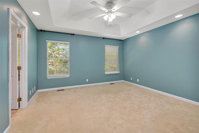 212 Stillwater Dr, Brunswick, GA 31525 - unfurnished room with ceiling fan, light carpet, a raised ceiling, baseboards, and recessed lighting