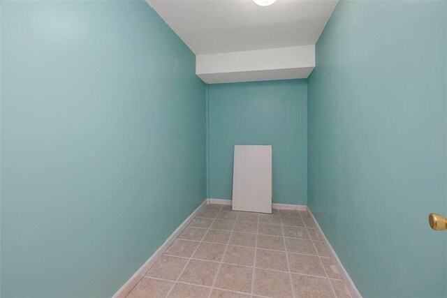 212 Stillwater Dr, Brunswick, GA 31525 - spare room featuring baseboards and light tile patterned floors