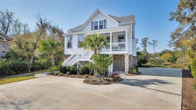 raised beach house with a porch