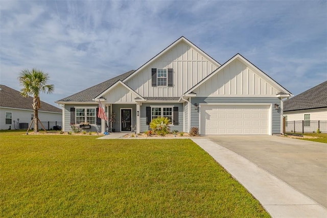 69 Allie Loop, Brunswick, GA 31525 - view of front of home with board and batten siding, driveway, and a garage