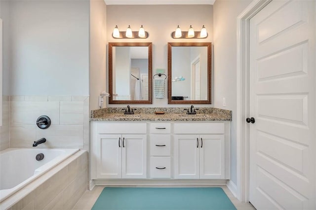 69 Allie Loop, Brunswick, GA 31525 - bathroom featuring a bath and double vanity