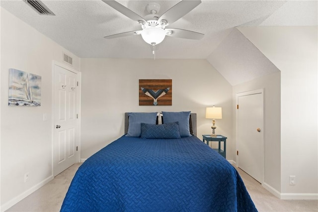 bedroom featuring baseboards, light carpet, a ceiling fan, and visible vents